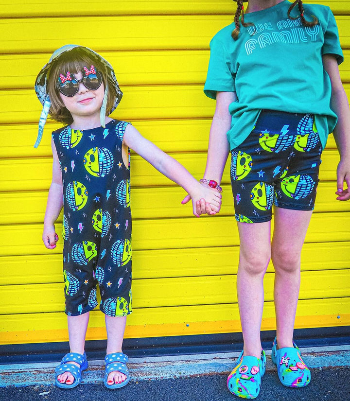 UV Glow Black Smiley Disco Short Legged Reversible Romper House of Happy Threads